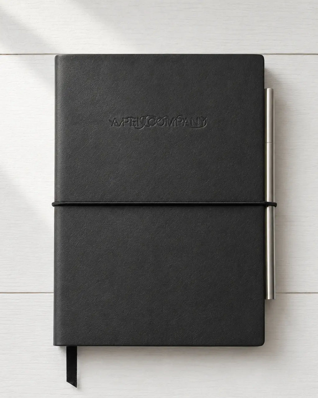 The Pen + The Notebook